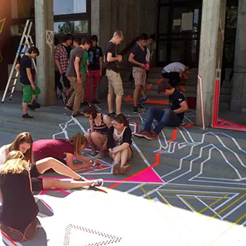 Tape art workshop in a high school