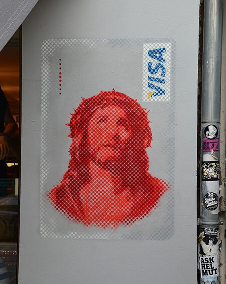 Jesus VISA graffiti- street art in Berlin Kastanienallee von Slava Ostap