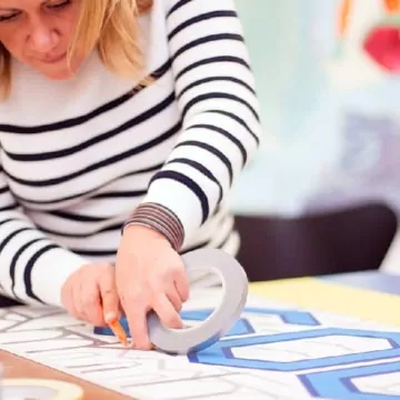 Concentrated on gluing- Tape Art Workshop by Ostap