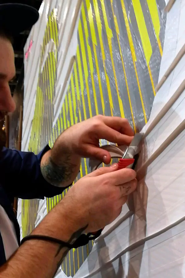 Tape artist while sticking