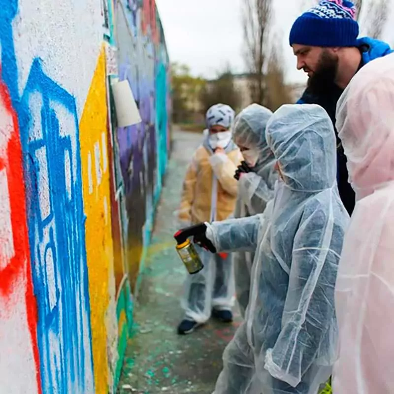 Graffiti kids at spraying- A workshop with Berlin street artist