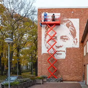 Portrait mural painting in prison- featured image