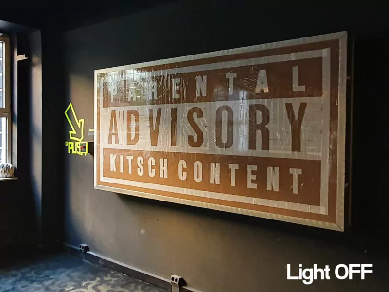 Parental Advisory Kitsch Content- artwork with lights off