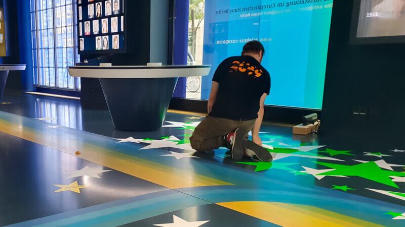 Selfmadecrew at work - taping the floor in the EU Commission building