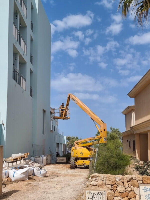 Mural art on hotels facade in progress